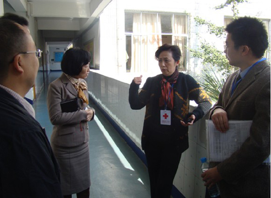 <em>李春城</em>之妻被免职前的工作照片