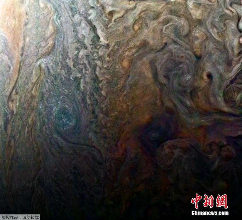 木星旋转暴风云清晰图像曝光 壮美如艺术巨作